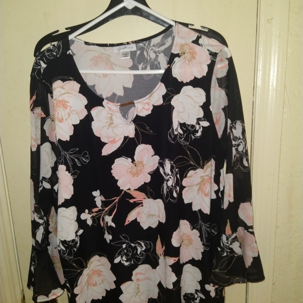 Women cream an black flower shirt